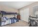 Well-lit bedroom with a bunk bed, study area, and neutral color scheme at 3488 S Bowman Rd, Apache Junction, AZ 85119