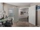 Bright bedroom featuring neutral walls, light carpet, and a large window providing ample natural light at 3488 S Bowman Rd, Apache Junction, AZ 85119