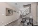 Welcoming entryway featuring wood-look floors, a staircase, and a storage unit for shoes and baskets at 3488 S Bowman Rd, Apache Junction, AZ 85119