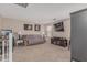 Spacious living room with modern furnishings, artwork, and entertainment setup at 3488 S Bowman Rd, Apache Junction, AZ 85119