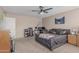 Neutral bedroom with a ceiling fan, comfortable decor, and carpet flooring at 3488 S Bowman Rd, Apache Junction, AZ 85119