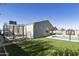 A view of the backyard complete with pool, basketball hoop and trampoline at 3914 E French Trotter St, San Tan Valley, AZ 85140