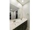 Bathroom with a double sink vanity and a large mirror, perfect for a modern and functional space at 3914 E French Trotter St, San Tan Valley, AZ 85140