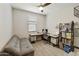 Functional bedroom with a desk, storage, and comfortable seating, ideal for work and relaxation at 3914 E French Trotter St, San Tan Valley, AZ 85140