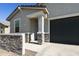 Beautiful single-Gathering home exterior showcasing a two-car garage and decorative stone accents at 3914 E French Trotter St, San Tan Valley, AZ 85140