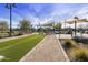 Outdoor games area with a bocce ball court, cornhole, seating and shade, perfect for Gathering fun at 3914 E French Trotter St, San Tan Valley, AZ 85140