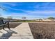 Serene neighborhood green space with walking paths and a relaxing bench at 3914 E French Trotter St, San Tan Valley, AZ 85140