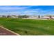 Lush green community park with playground equipment for families at 3914 E French Trotter St, San Tan Valley, AZ 85140