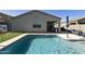 Sparkling blue pool with easy access to the covered patio and outdoor living space at 3914 E French Trotter St, San Tan Valley, AZ 85140