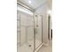Elegant shower features a glass door and tiled surround, offering a modern and clean design at 3914 E French Trotter St, San Tan Valley, AZ 85140