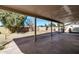 This spacious back patio offers a covered area perfect for outdoor dining and entertaining in a private backyard at 4004 W Myrtle Ave, Phoenix, AZ 85051