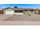 Charming single-story home featuring a desert landscape and a convenient two-car garage at 4004 W Myrtle Ave, Phoenix, AZ 85051