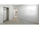 Bright, carpeted bedroom offering a closet and an ensuite bathroom at 42875 W Vincent Dr, Maricopa, AZ 85138