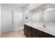 Bathroom featuring double sink vanity with modern fixtures and tile flooring at 42900 W Peters Dr, Maricopa, AZ 85138
