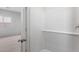 Bright shower with tiled walls, next to the bedroom at 42900 W Peters Dr, Maricopa, AZ 85138