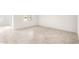 Empty bedroom with neutral tile flooring at 42925 W Palo Amarillo Rd, Maricopa, AZ 85138