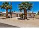 Single-story home with a two-car garage and desert landscaping at 4702 W Northview Ave, Glendale, AZ 85301