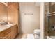 Bathroom featuring a marble countertop vanity and tiled shower at 4808 N 24Th St # 204, Phoenix, AZ 85016