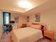 Cozy bedroom with a comfortable bed, desk, and natural light at 4808 N 24Th St # 204, Phoenix, AZ 85016