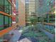 Beautiful courtyard with lush landscaping and modern architecture at 4808 N 24Th St # 204, Phoenix, AZ 85016