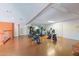 Bright gym with various exercise equipment including bikes, weights, and mirrors for a complete workout at 4808 N 24Th St # 204, Phoenix, AZ 85016