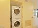 Laundry area with a stacked washer and dryer at 4808 N 24Th St # 204, Phoenix, AZ 85016