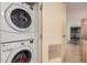 Laundry area featuring a stacked washer and dryer at 4808 N 24Th St # 204, Phoenix, AZ 85016