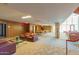 Open lobby area with lounge seating and tables, creating a welcoming and social atmosphere at 4808 N 24Th St # 204, Phoenix, AZ 85016