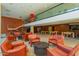 Bright and inviting lobby space with modern seating and a staircase leading to the upper level at 4808 N 24Th St # 204, Phoenix, AZ 85016