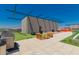 Stunning rooftop deck with seating, BBQ, and panoramic views of the surrounding mountains and valley at 4808 N 24Th St # 204, Phoenix, AZ 85016