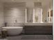 Modern bathroom featuring a soaking tub, dual vanity, and stylish fixtures at 5050 N Camelback Ridge Dr # 1301, Scottsdale, AZ 85251