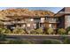 Modern condo building with balconies overlooking desert landscape at 5050 N Camelback Ridge Dr # 1301, Scottsdale, AZ 85251