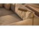 Close up of modern brass adjustable lamp next to a comfy couch at 5050 N Camelback Ridge Dr # 1301, Scottsdale, AZ 85251