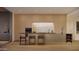 A modern kitchen with an island and sleek appliances at 5050 N Camelback Ridge Dr # 1301, Scottsdale, AZ 85251