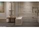 A luxurious walk-in shower features elegant tiling and a built-in bench at 5050 N Camelback Ridge Dr # 1301, Scottsdale, AZ 85251