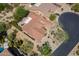 Overhead view of tiled roof home and desert landscaped backyard and driveway at 5336 E Gloria Ln, Cave Creek, AZ 85331