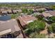 Aerial shot of a desert home nestled among mature trees in a quiet neighborhood at 5336 E Gloria Ln, Cave Creek, AZ 85331