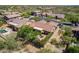 Aerial view of desert home with tile roof featuring a private backyard, patio area, and desert landscaping at 5336 E Gloria Ln, Cave Creek, AZ 85331