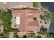 Overhead shot of home with terracotta roof showing unique architecture and desert landscaping at 5336 E Gloria Ln, Cave Creek, AZ 85331
