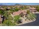 Aerial view of a beautiful desert home with well-maintained landscaping and a tile roof at 5336 E Gloria Ln, Cave Creek, AZ 85331