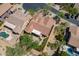 Bird's eye view of home featuring terracotta tile roof, desert landscape, and outdoor living spaces at 5336 E Gloria Ln, Cave Creek, AZ 85331