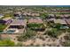 Home aerial shot with a tile roof, desert landscaping, and a private backyard swimming pool at 5336 E Gloria Ln, Cave Creek, AZ 85331