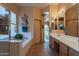 Well-lit bathroom with walk-in shower, soaking tub and double sink vanity at 5336 E Gloria Ln, Cave Creek, AZ 85331