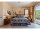 Cozy main bedroom featuring a decorative rug, ceiling fan, and great natural light at 5336 E Gloria Ln, Cave Creek, AZ 85331
