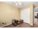 Bedroom featuring a white sliding closet door, neutral walls, and wood-look tile floors at 5536 E Gable Ave, Mesa, AZ 85206
