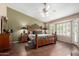 Main bedroom featuring tiled floors, a large window, and a spacious design at 5536 E Gable Ave, Mesa, AZ 85206