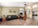 Spacious home office with tile floors, large desk, comfortable seating, and a painting at 5536 E Gable Ave, Mesa, AZ 85206