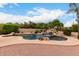 Sparkling backyard pool featuring a rock waterfall, perfect for relaxation and outdoor enjoyment at 5536 E Gable Ave, Mesa, AZ 85206