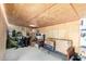 Storage room with plywood walls and ceiling, used to store various items and boxes at 5536 E Gable Ave, Mesa, AZ 85206