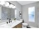 Updated bathroom featuring modern fixtures and a large mirror at 6441 E Julep St, Mesa, AZ 85205